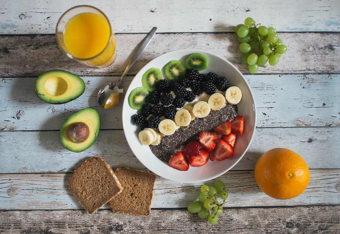 Whole grain toast with avocado and fresh vegetables